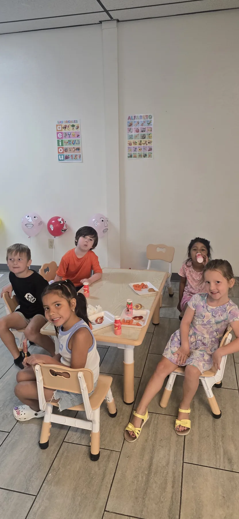 A group of campers sitting together during a Summer Camp activity