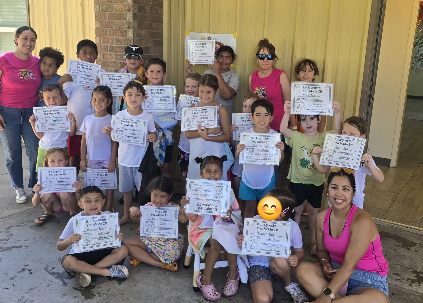My Little Escuelita Summer Camp group celebrating with their certificates