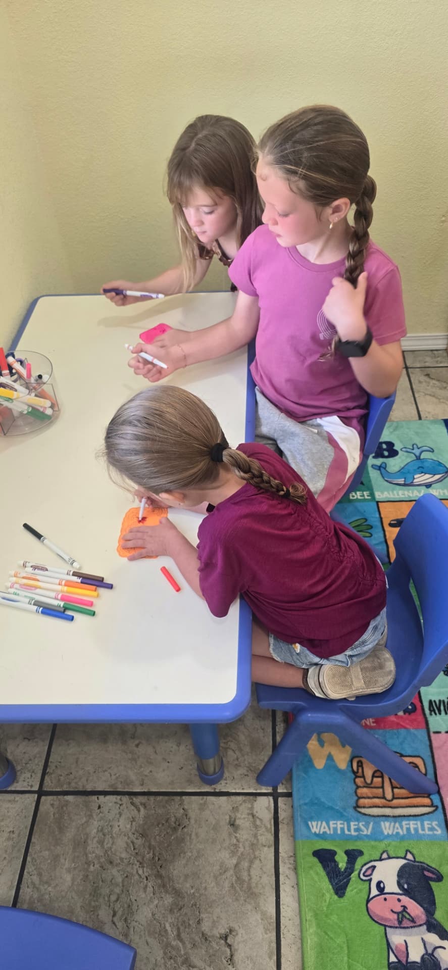 Students creating a hands-on classroom project